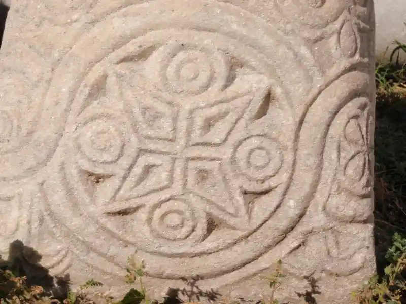 Cross with rays and four circles, solar disc